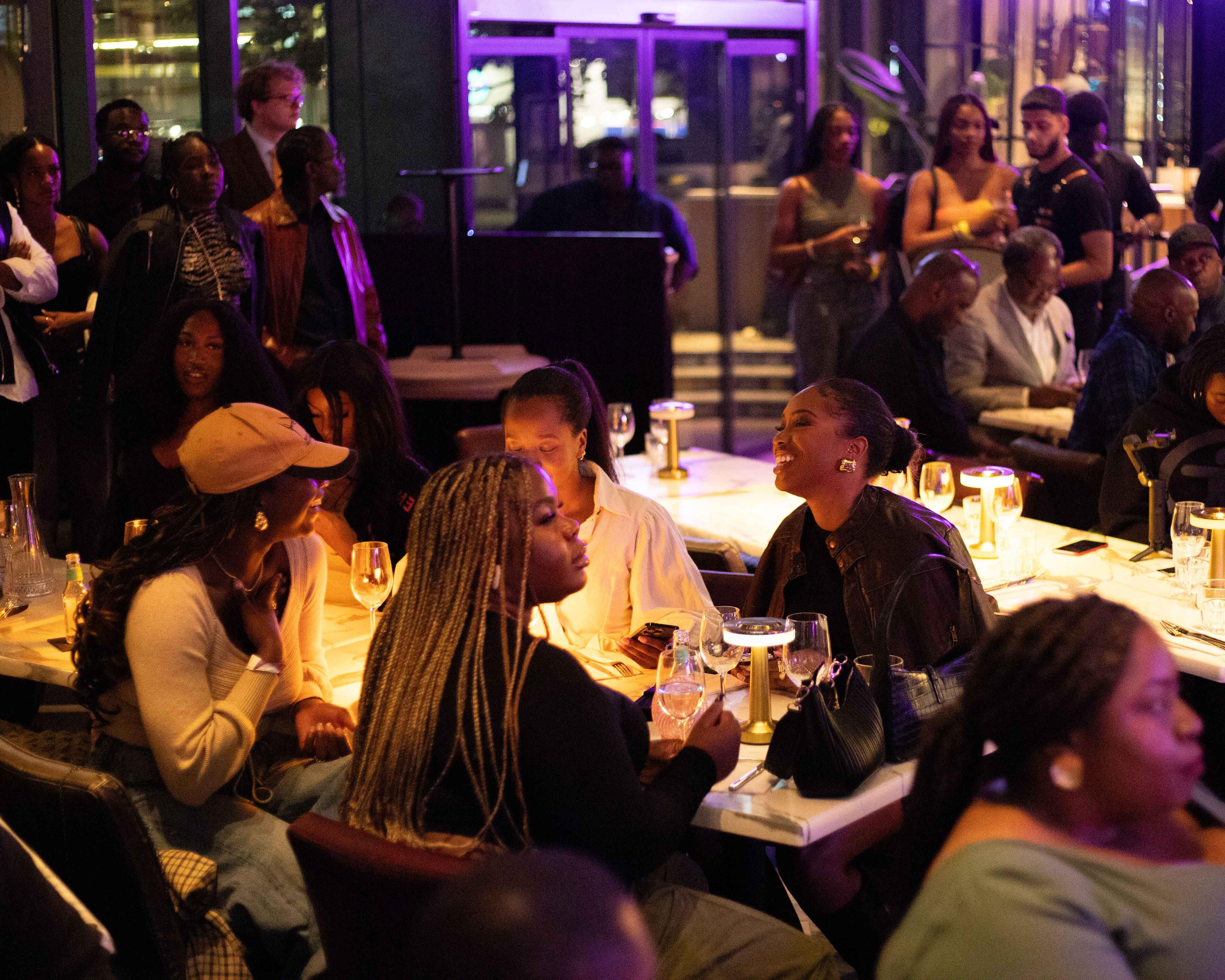 Guests sharing an evening of live music at AfroJazz Fest London